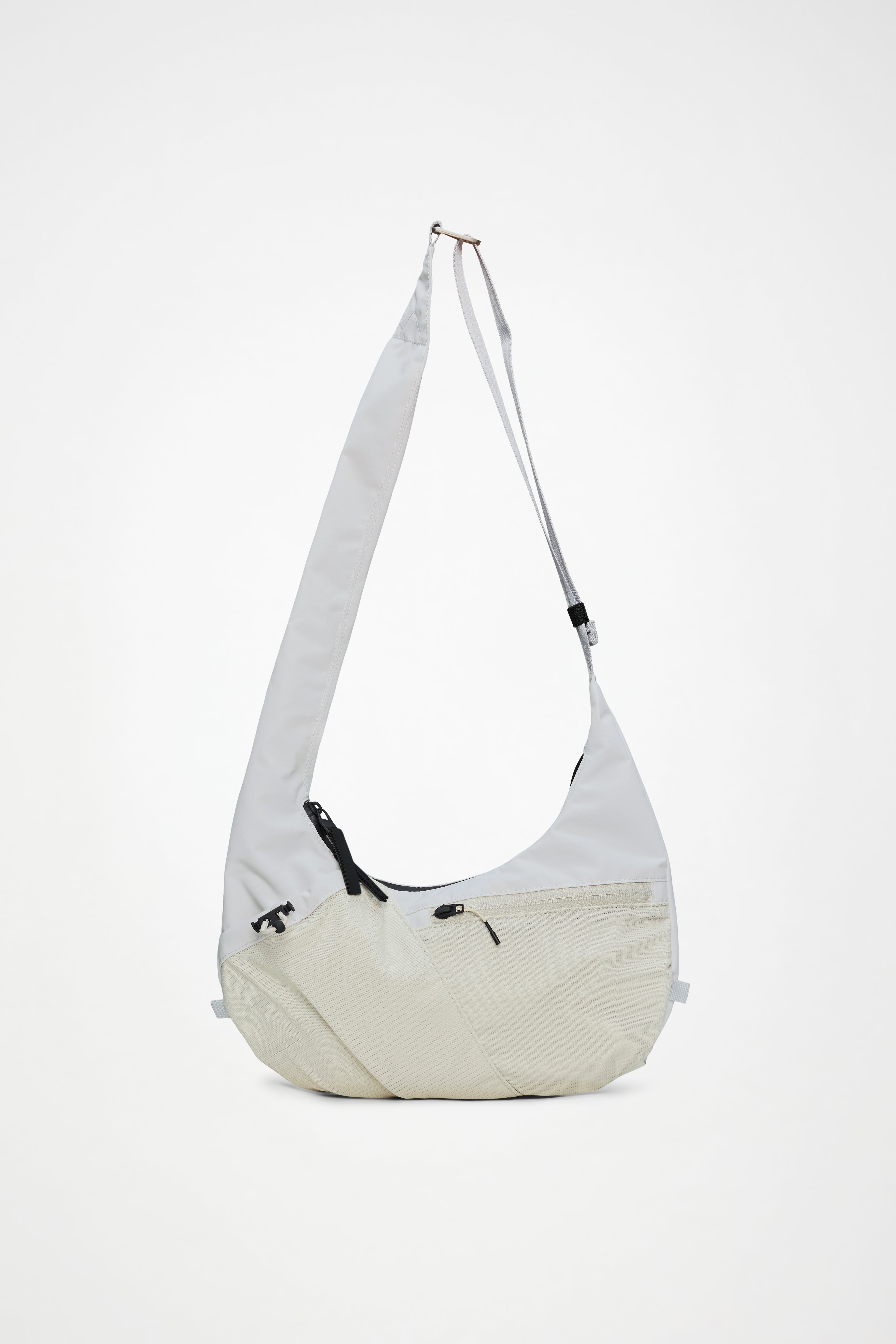 RAINS Niseko Crossbody Bag Blizzard 18L H19.50 x D10 x W36 cm Crossbody