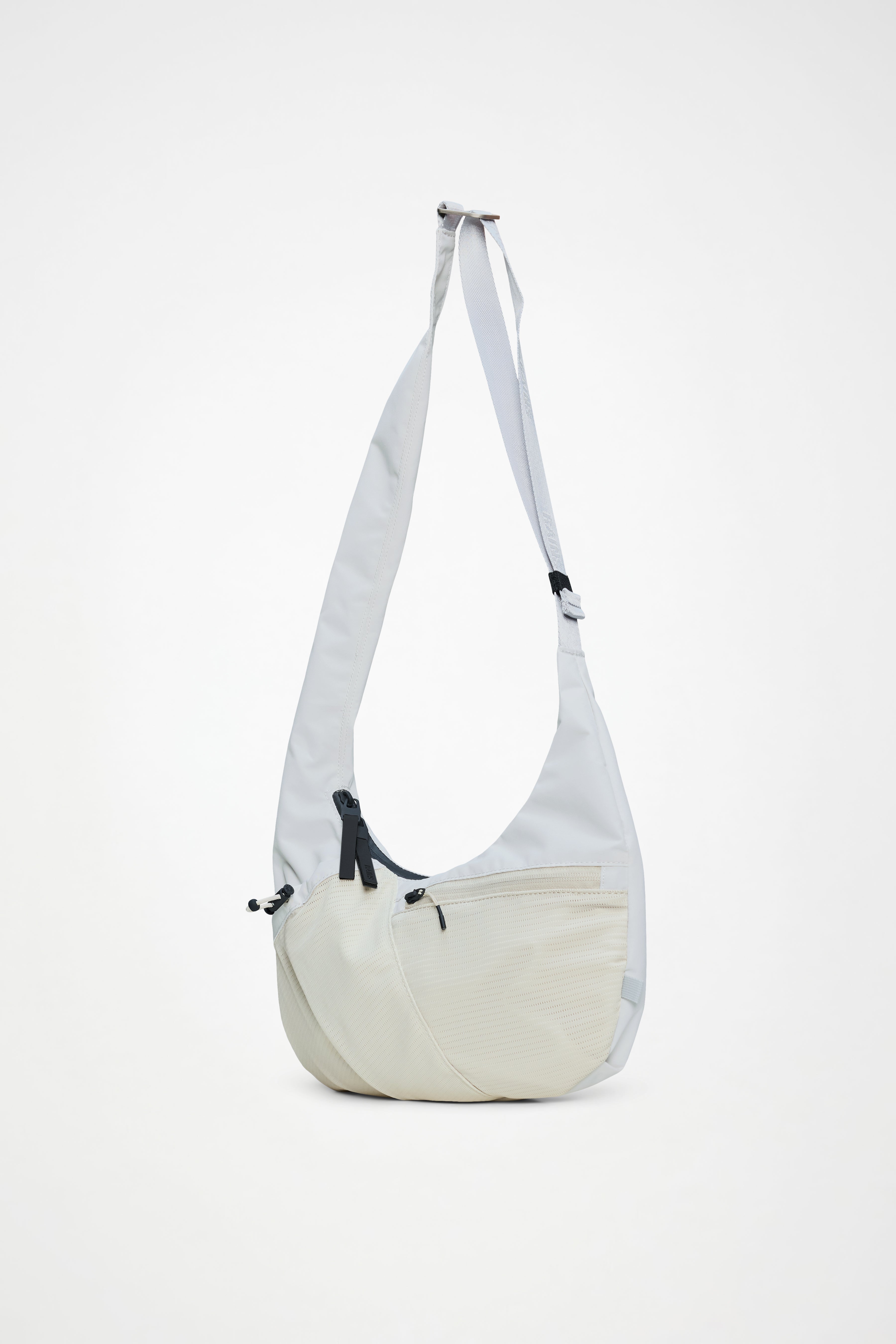 RAINS Niseko Crossbody Bag Blizzard 18L H19.50 x D10 x W36 cm Crossbody